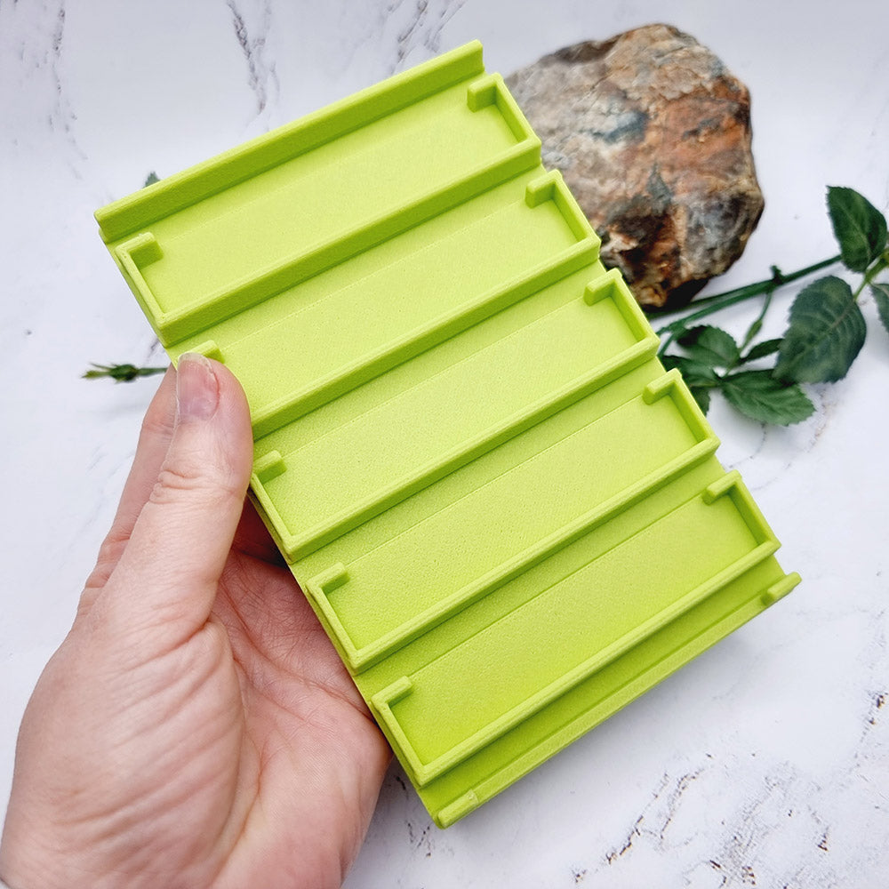 Baking base holder with angled slots for polymer clay baking