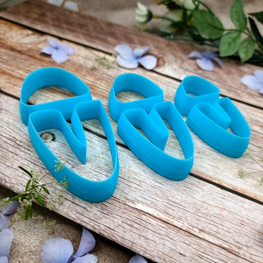 Blue PLA U-shape polymer clay cutter set in three sizes, arch cap and U piece, with finished two-tone clay earring components by SweetyBijou