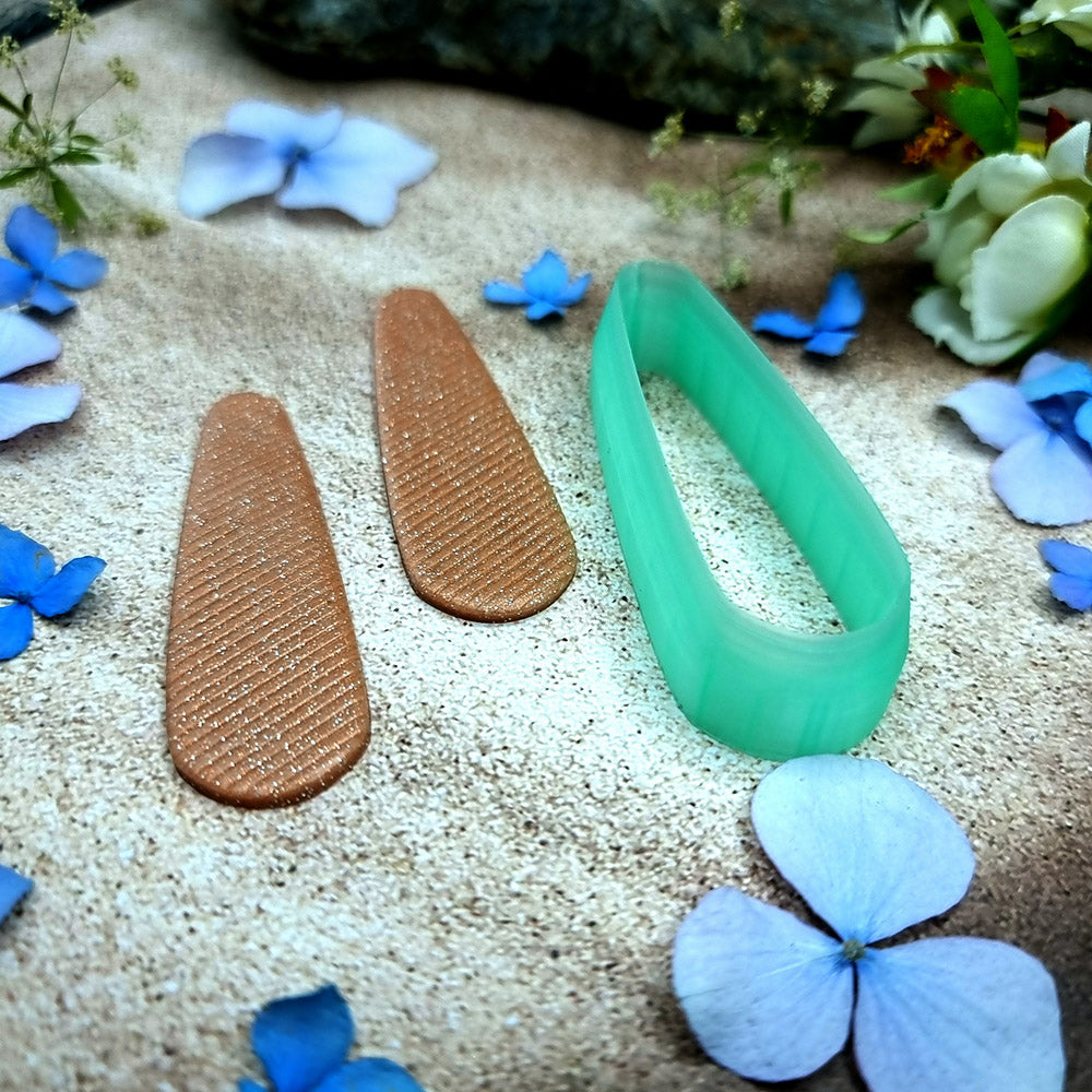Green PLA capsule bar polymer clay cutter with fully rounded ends and terracotta clay bar earring pieces by SweetyBijou