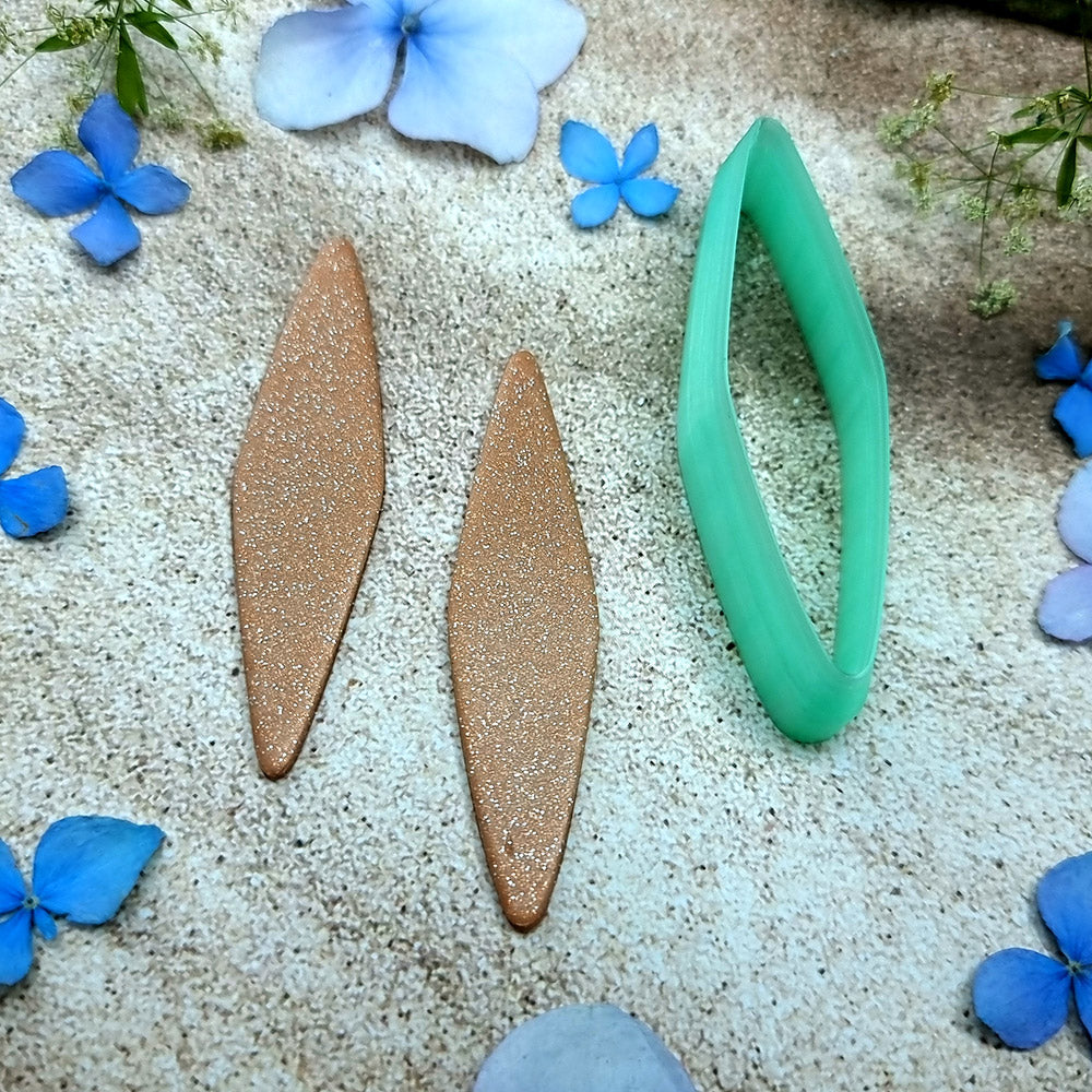 Green PLA willow leaf polymer clay cutter with sharp pointed ends and terracotta clay leaf earring pieces by SweetyBijou