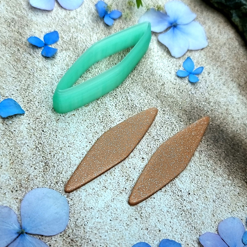 Green PLA willow leaf polymer clay cutter with sharp pointed ends and terracotta clay leaf earring pieces by SweetyBijou