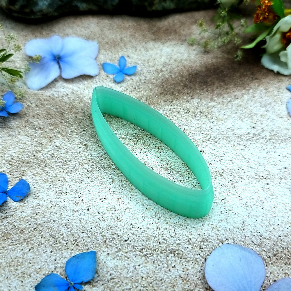 Green PLA almond drop polymer clay cutter with softly pointed ends and terracotta clay almond earring pieces by SweetyBijou