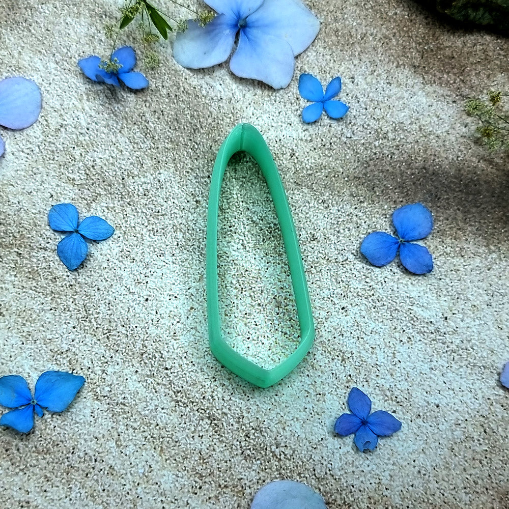Green PLA angled dagger polymer clay cutter with a slanted base and terracotta clay blade earring pieces by SweetyBijou