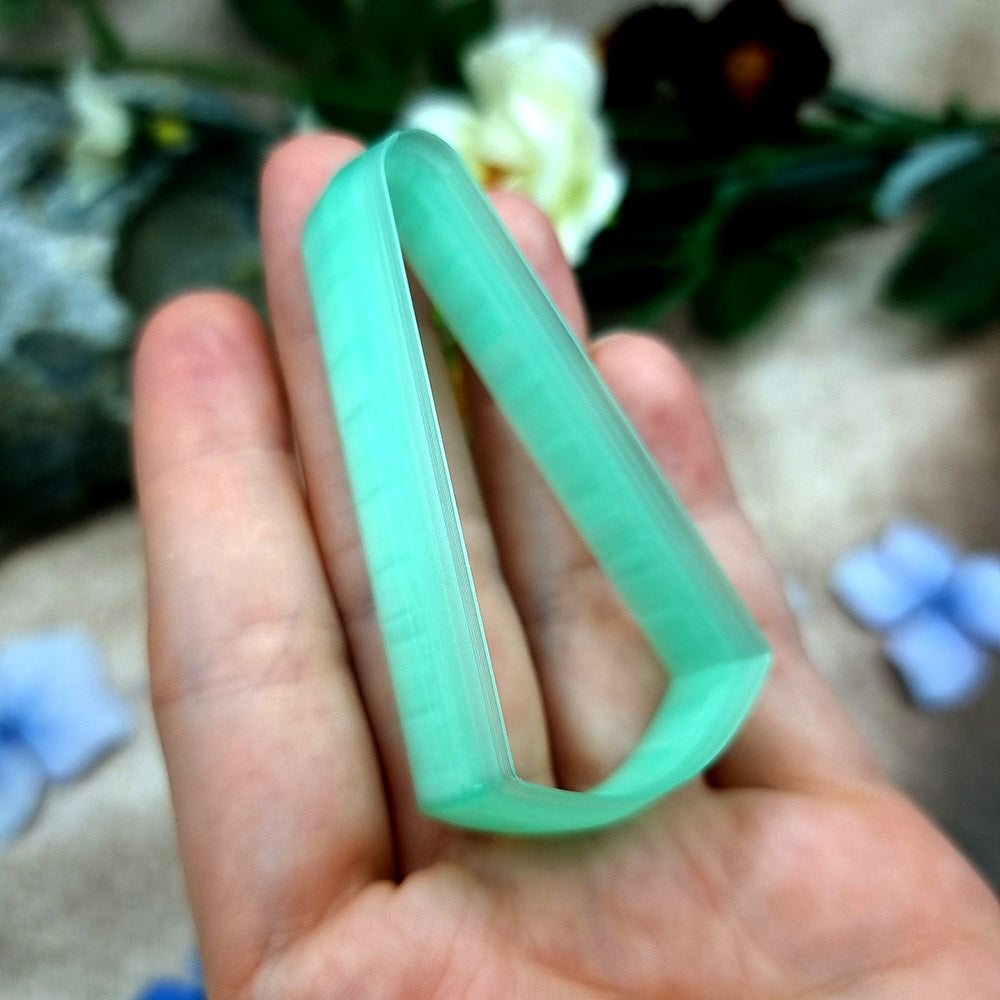 Green PLA slanted wedge polymer clay cutter with a broad angled base and terracotta clay wedge earring pieces by SweetyBijou