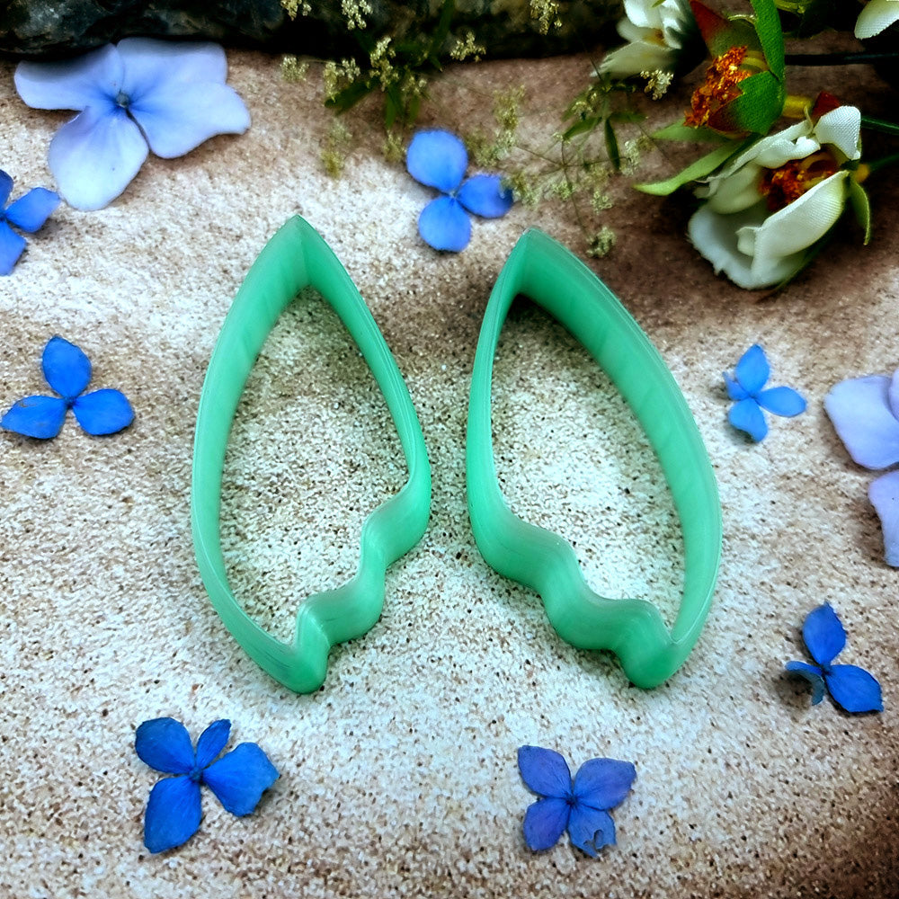 Pair of mirrored green PLA flame petal polymer clay cutters, a left and a right cutter, for long statement earrings by SweetyBijou