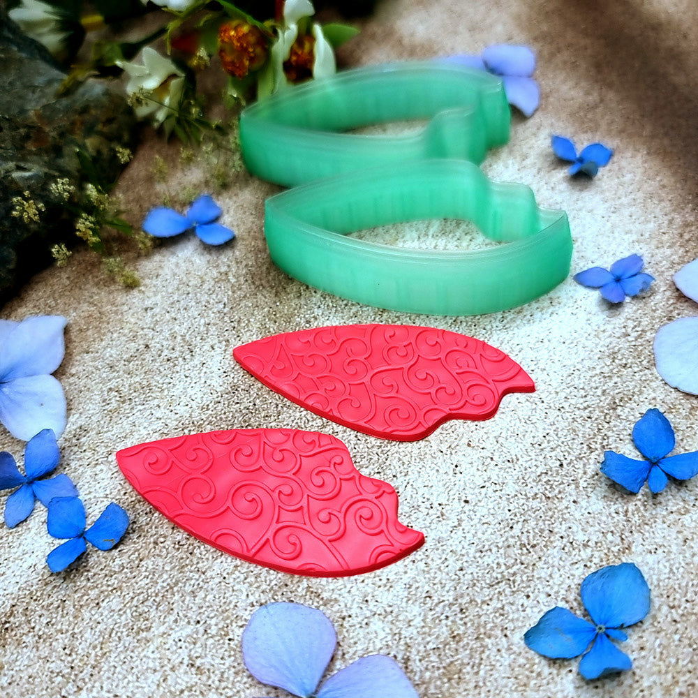 Pair of mirrored green PLA flame petal polymer clay cutters, a left and a right cutter, for long statement earrings by SweetyBijou