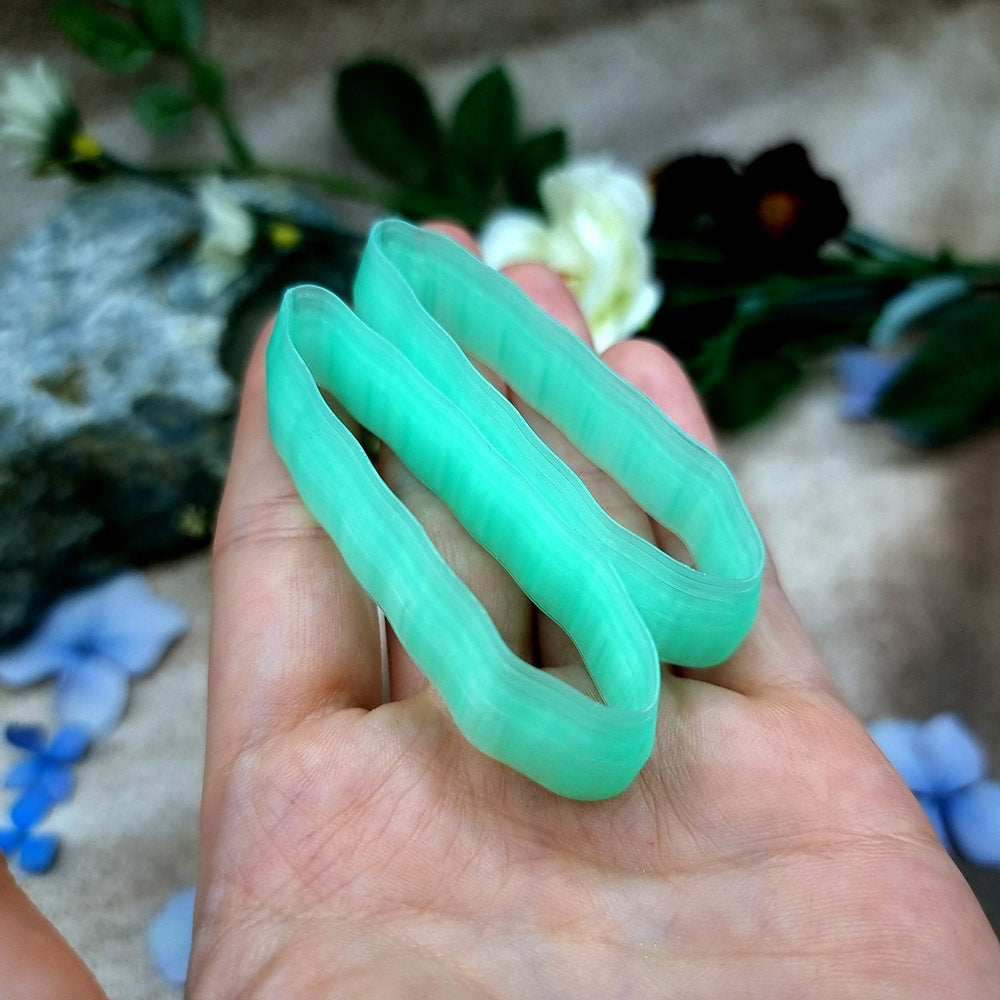 Pair of mirrored green PLA slim petal polymer clay cutters, a left and a right cutter, for long statement earrings by SweetyBijou