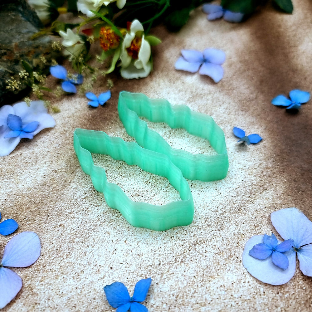 Pair of mirrored green PLA scalloped leaf polymer clay cutters, a left and a right cutter, for long statement earrings by SweetyBijou