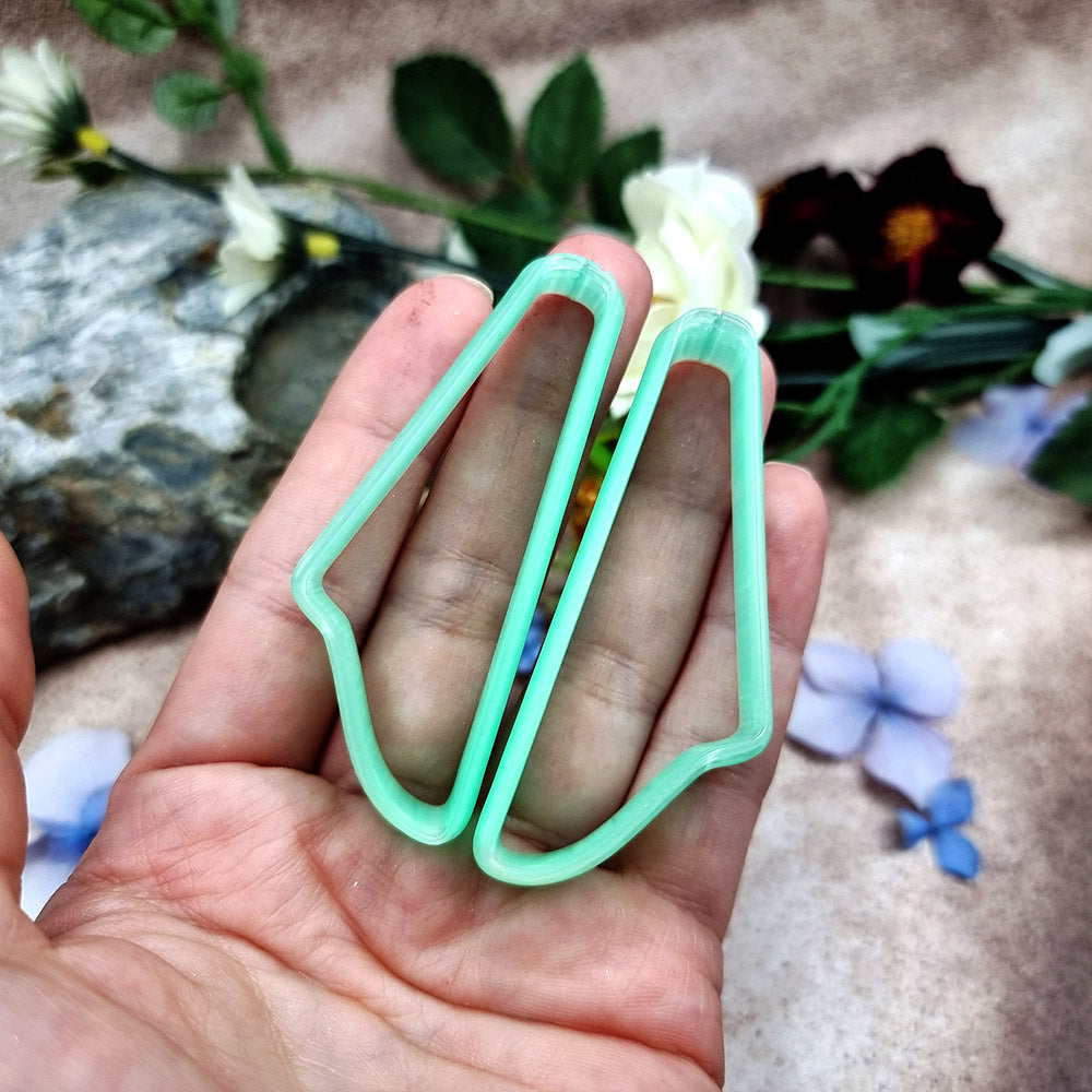 Pair of mirrored green PLA swoosh wing polymer clay cutters, a left and a right cutter, for long statement earrings by SweetyBijou