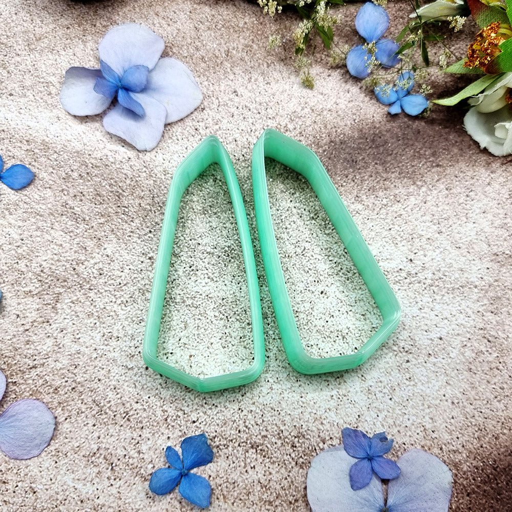 Pair of mirrored green PLA broad wedge polymer clay cutters, a left and a right cutter, for long statement earrings by SweetyBijou