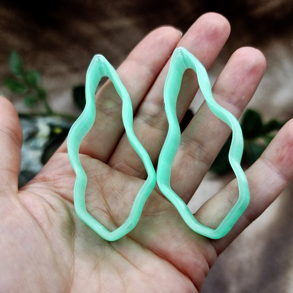 Pair of mirrored green PLA wavy feather polymer clay cutters, a left and a right cutter, for long statement earrings by SweetyBijou