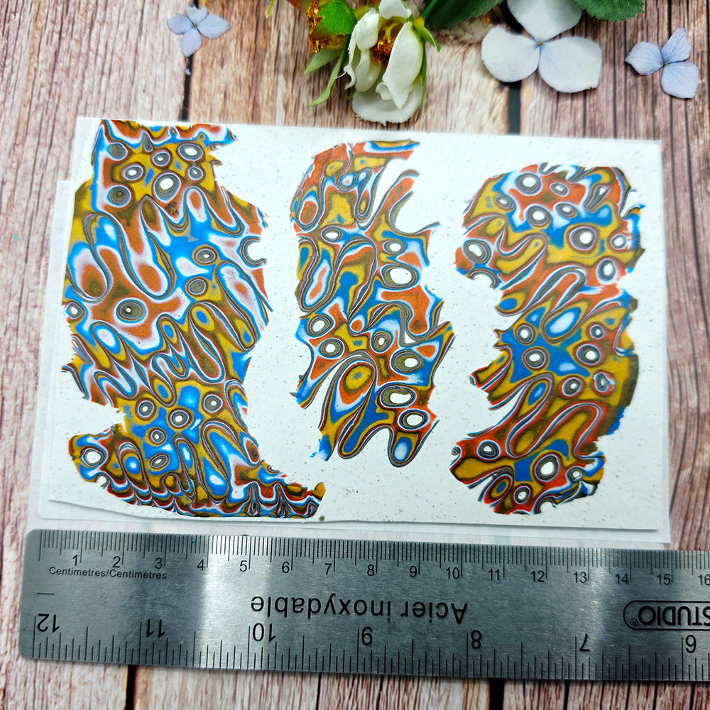 Raw polymer clay veneer sheet, Coral Lagoon Mokume Gane