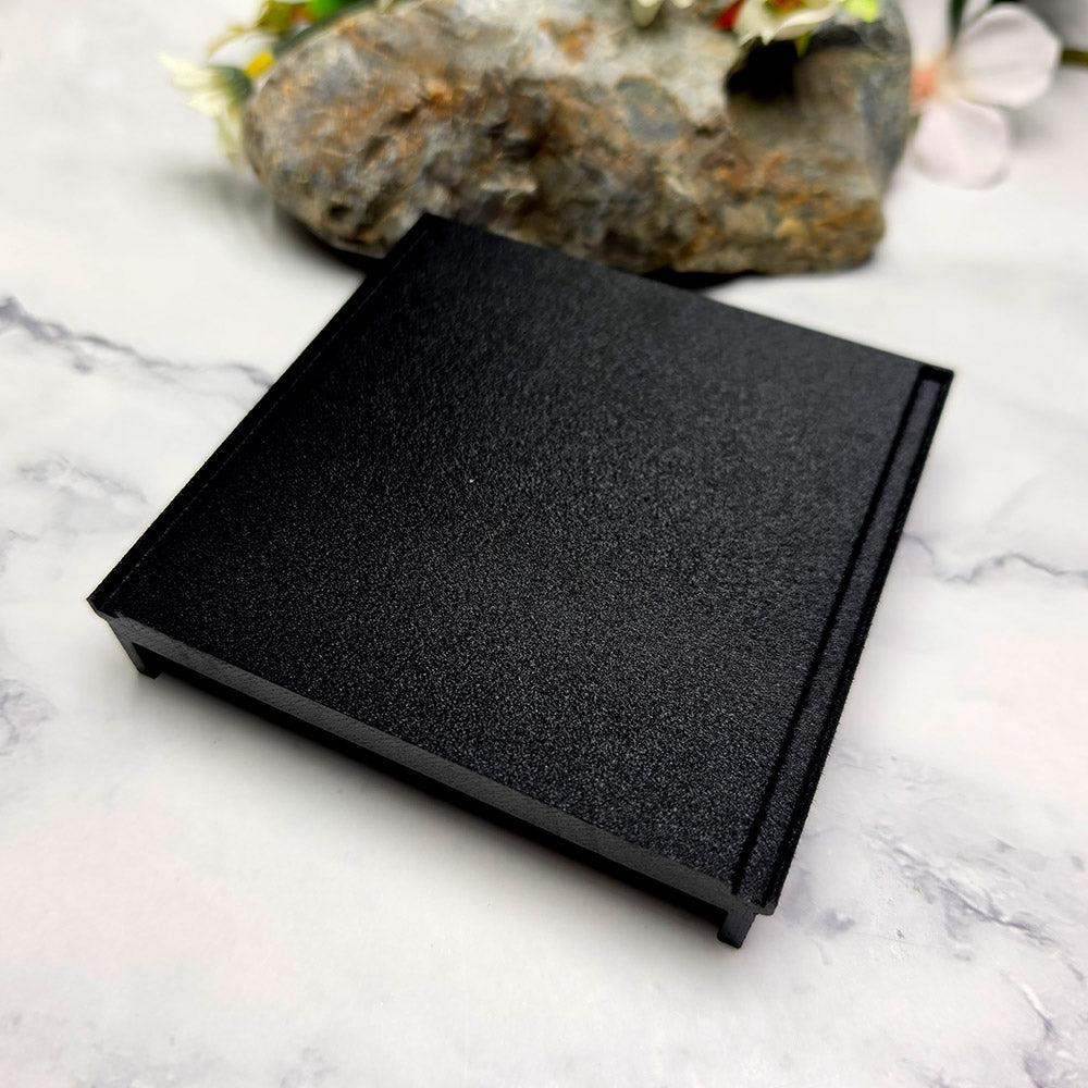 Black squared stackable flat textured baking base for polymer clay