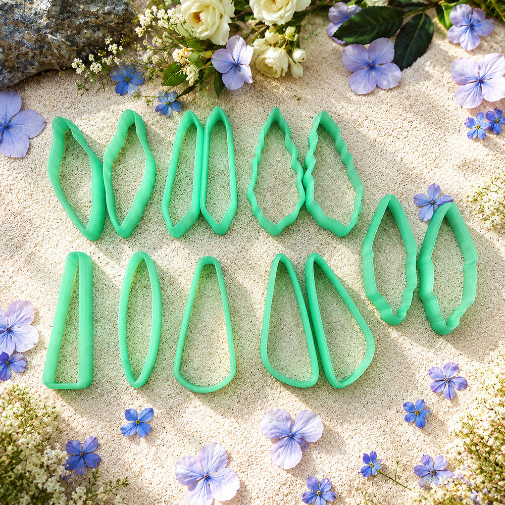 Bundle of green PLA long polymer clay cutters in leaf, teardrop, kite and bar shapes, all 6 cm long, for statement earrings by SweetyBijou