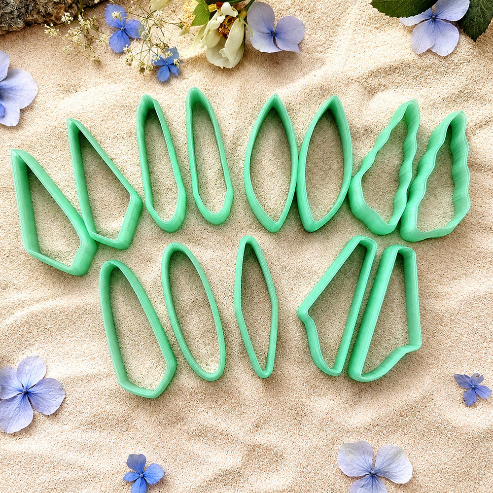 Bundle of green PLA long polymer clay cutters in mirrored leaf, wedge and bar shapes, all 6 cm long, for statement earrings by SweetyBijou