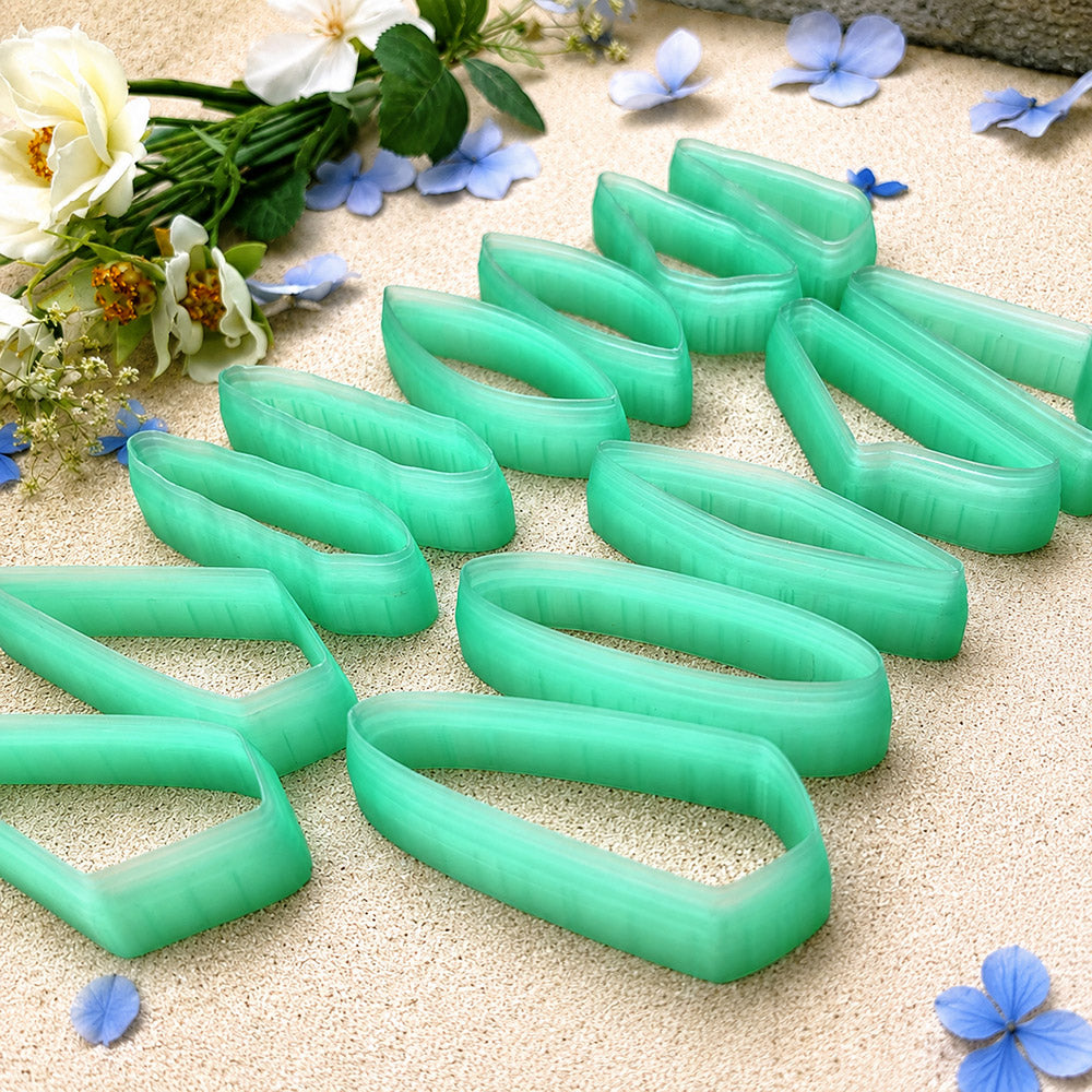 Bundle of green PLA long polymer clay cutters in mirrored leaf, wedge and bar shapes, all 6 cm long, for statement earrings by SweetyBijou