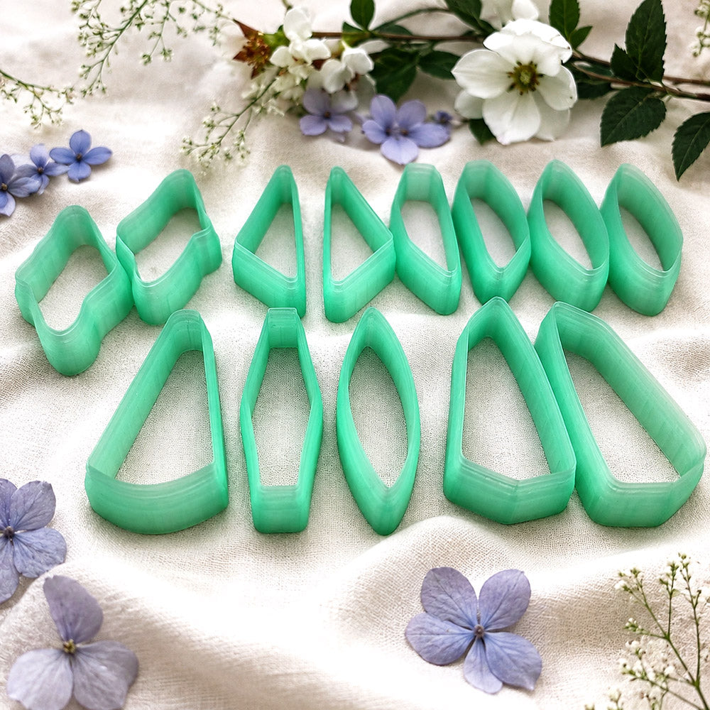 Bundle of green PLA long polymer clay cutters in slim marquise, oval and wedge shapes, all 6 cm long, for statement earrings by SweetyBijou