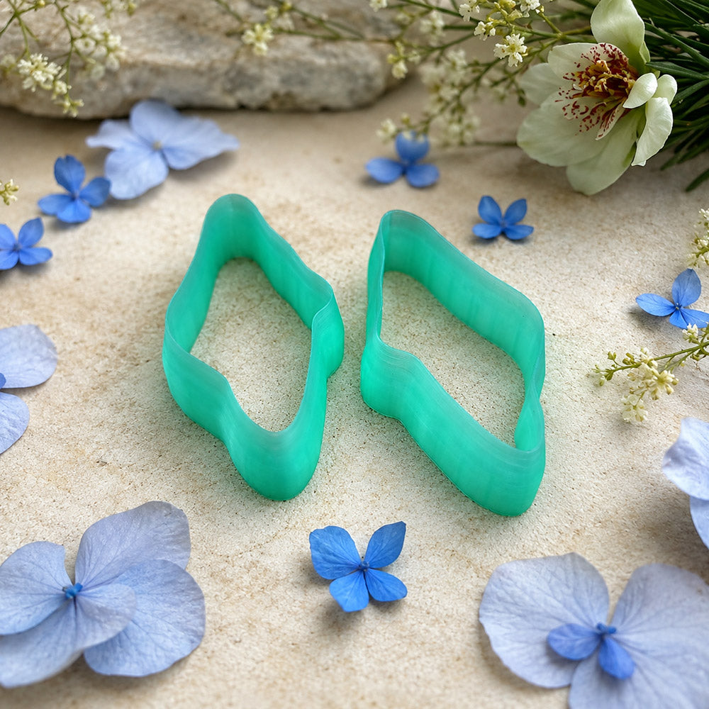 Pair of mirrored green PLA wavy pebble polymer clay cutters, a left and a right cutter, for long statement earrings by SweetyBijou