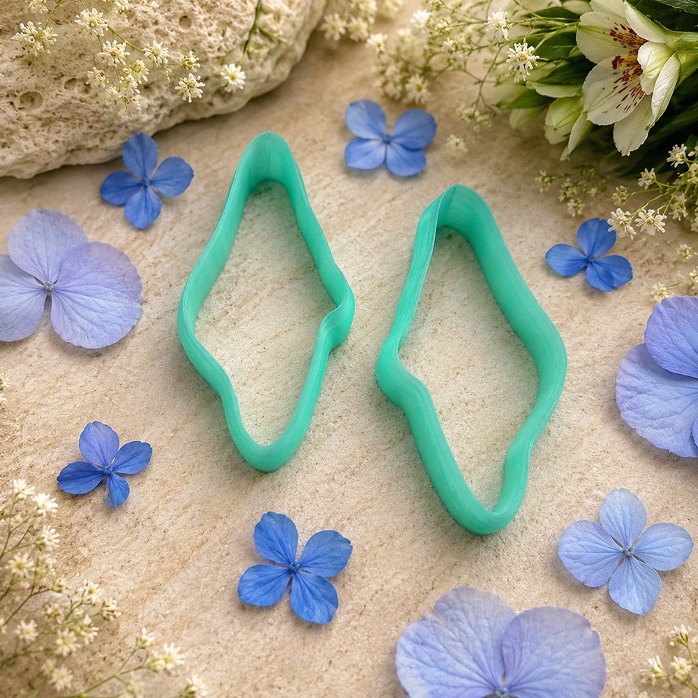 Pair of mirrored green PLA wavy pebble polymer clay cutters, a left and a right cutter, for long statement earrings by SweetyBijou