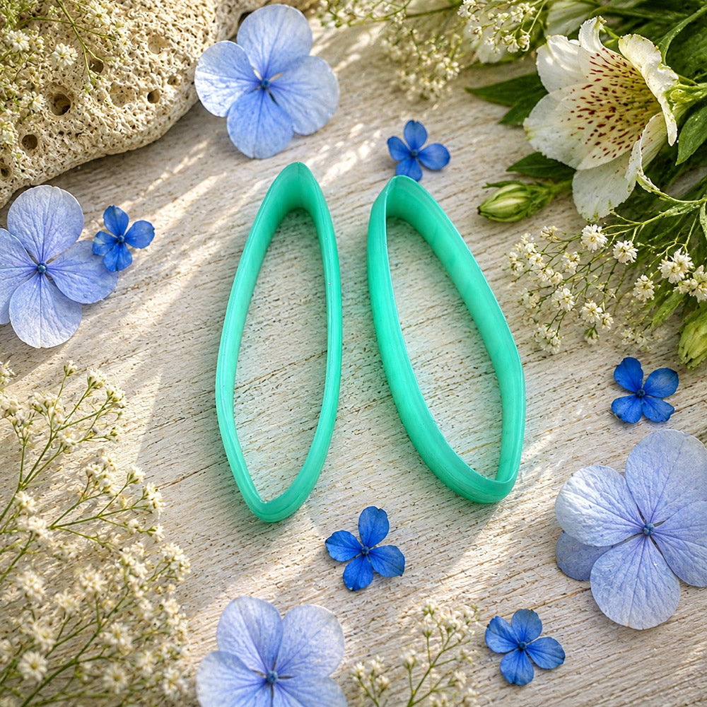 Pair of mirrored green PLA swept oval polymer clay cutters, a left and a right cutter, for long statement earrings by SweetyBijou