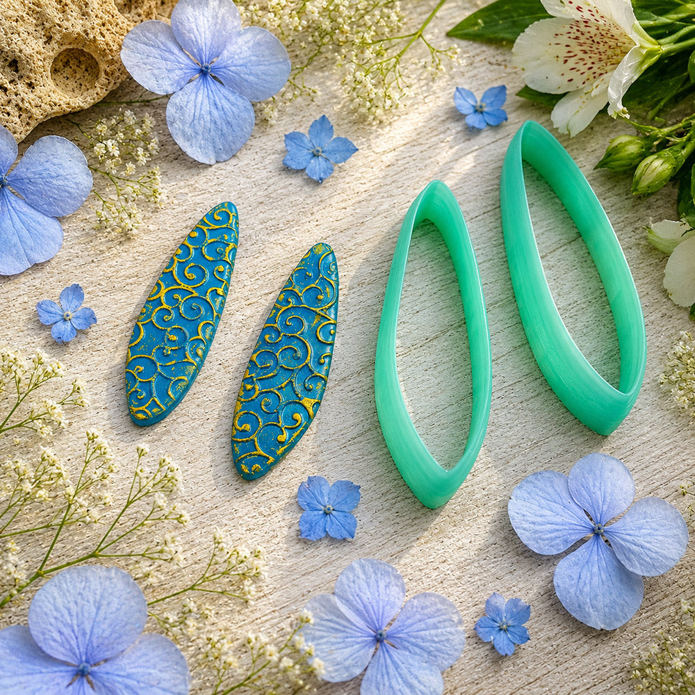 Pair of mirrored green PLA swept oval polymer clay cutters, a left and a right cutter, for long statement earrings by SweetyBijou