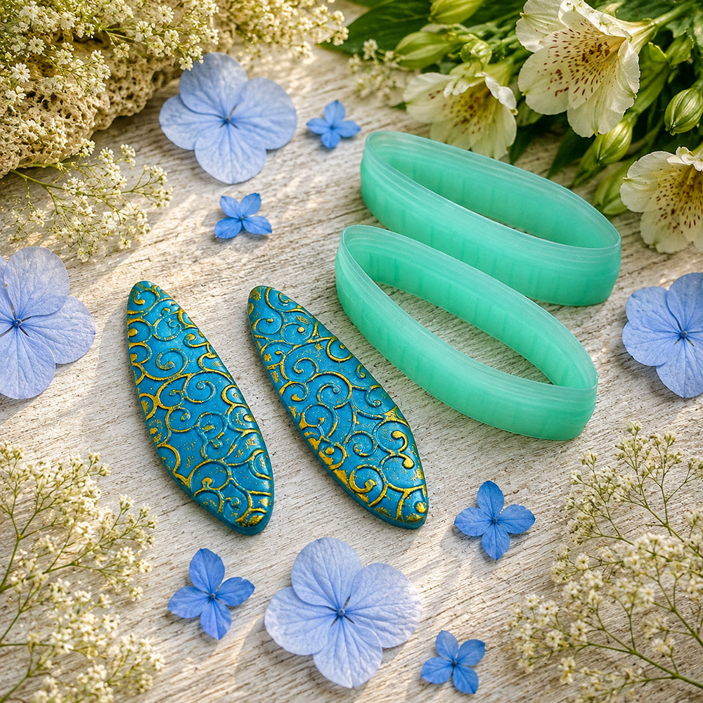 Pair of mirrored green PLA swept oval polymer clay cutters, a left and a right cutter, for long statement earrings by SweetyBijou