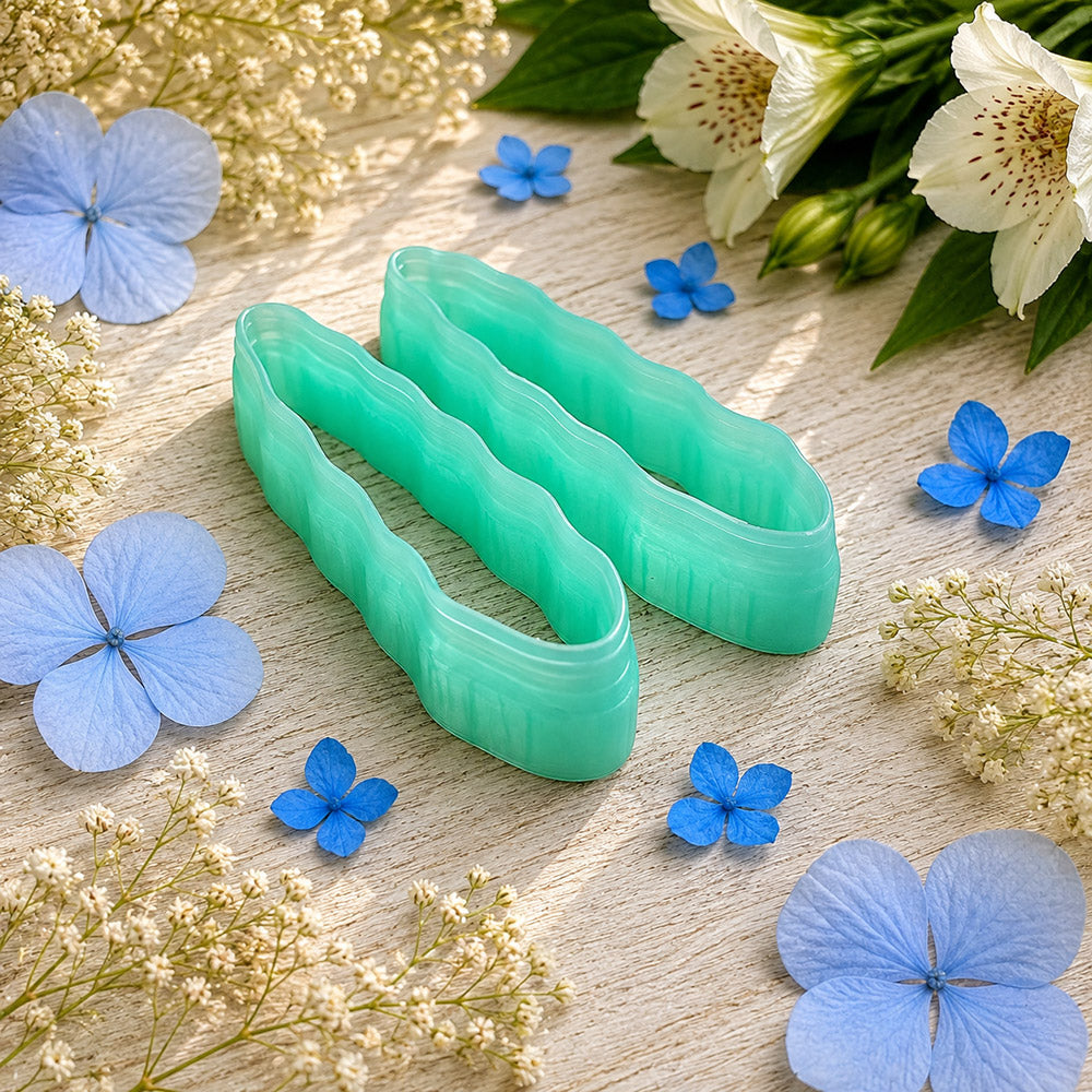 Pair of mirrored green PLA slim petal polymer clay cutters, a left and a right cutter, for long statement earrings by SweetyBijou