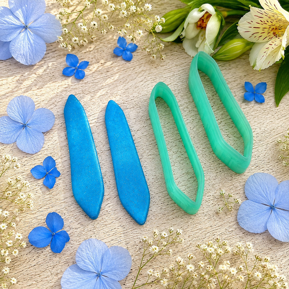 Pair of mirrored green PLA chisel quill polymer clay cutters, a left and a right cutter, for long statement earrings by SweetyBijou