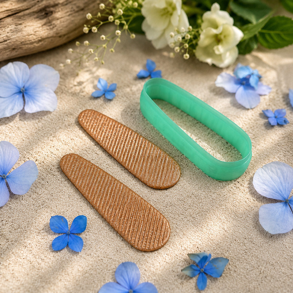 Green PLA capsule bar polymer clay cutter with fully rounded ends and terracotta clay bar earring pieces by SweetyBijou