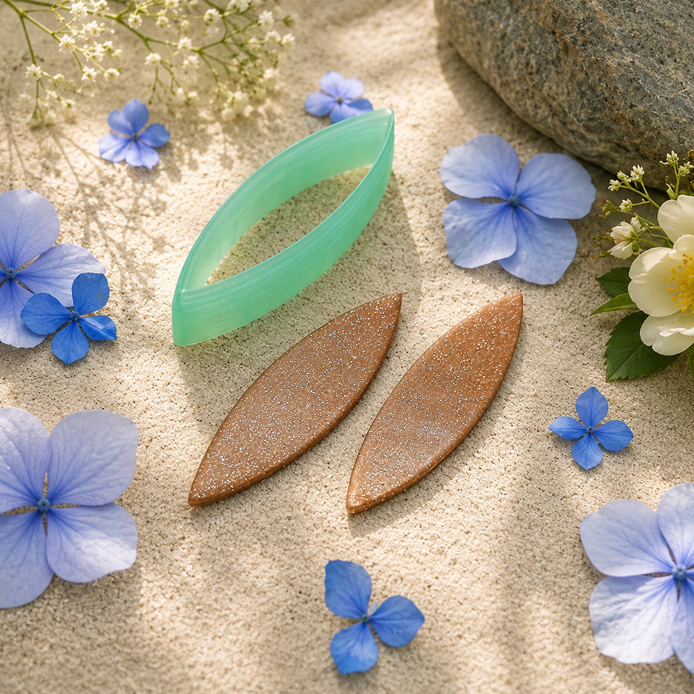 Green PLA broad leaf polymer clay cutter with a pointed marquise outline and terracotta clay leaf earring pieces by SweetyBijou