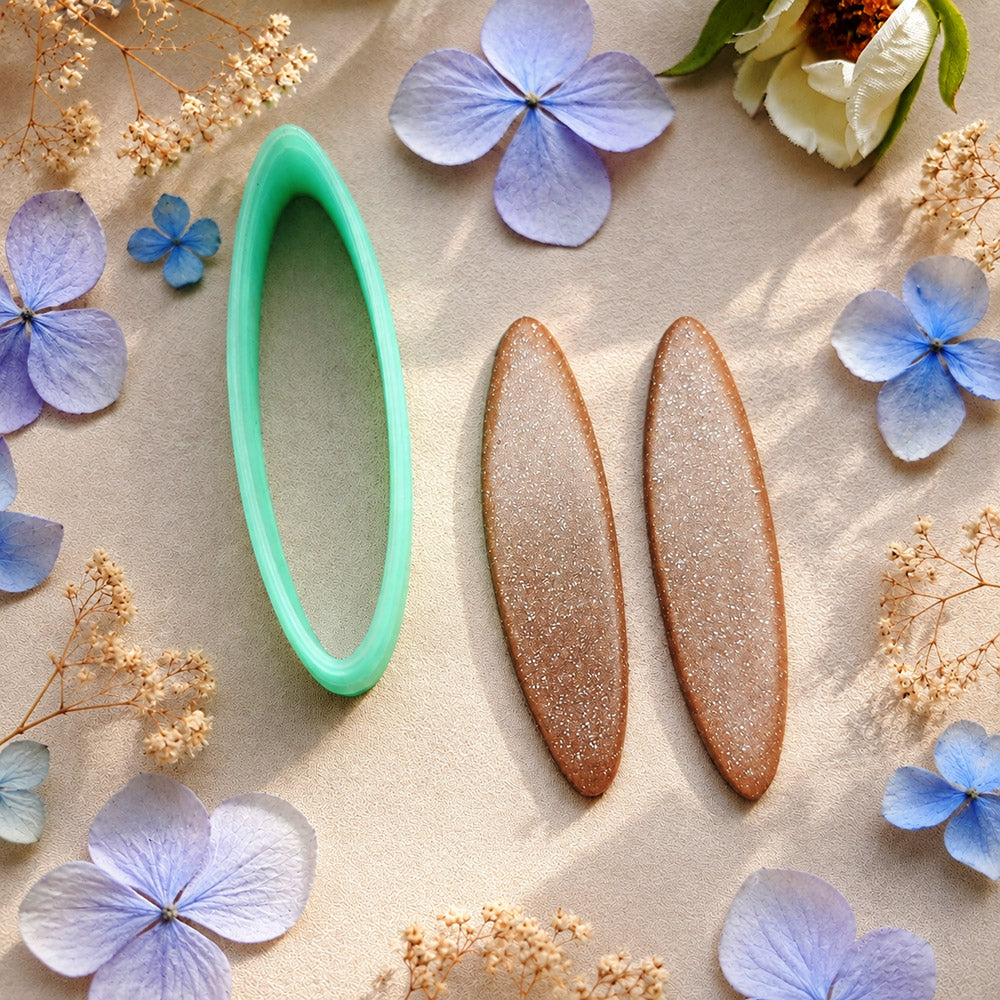 Green PLA slim marquise polymer clay cutter pointed at both ends with terracotta clay marquise earring pieces by SweetyBijou