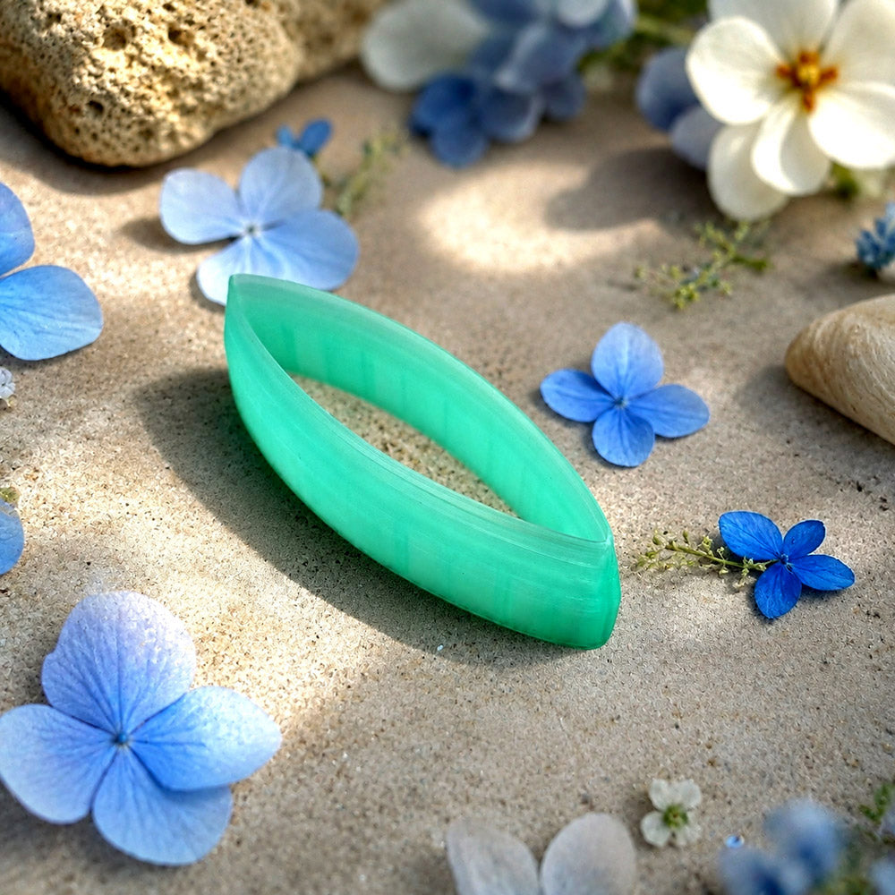 Green PLA broad leaf polymer clay cutter with a pointed marquise outline and terracotta clay leaf earring pieces by SweetyBijou