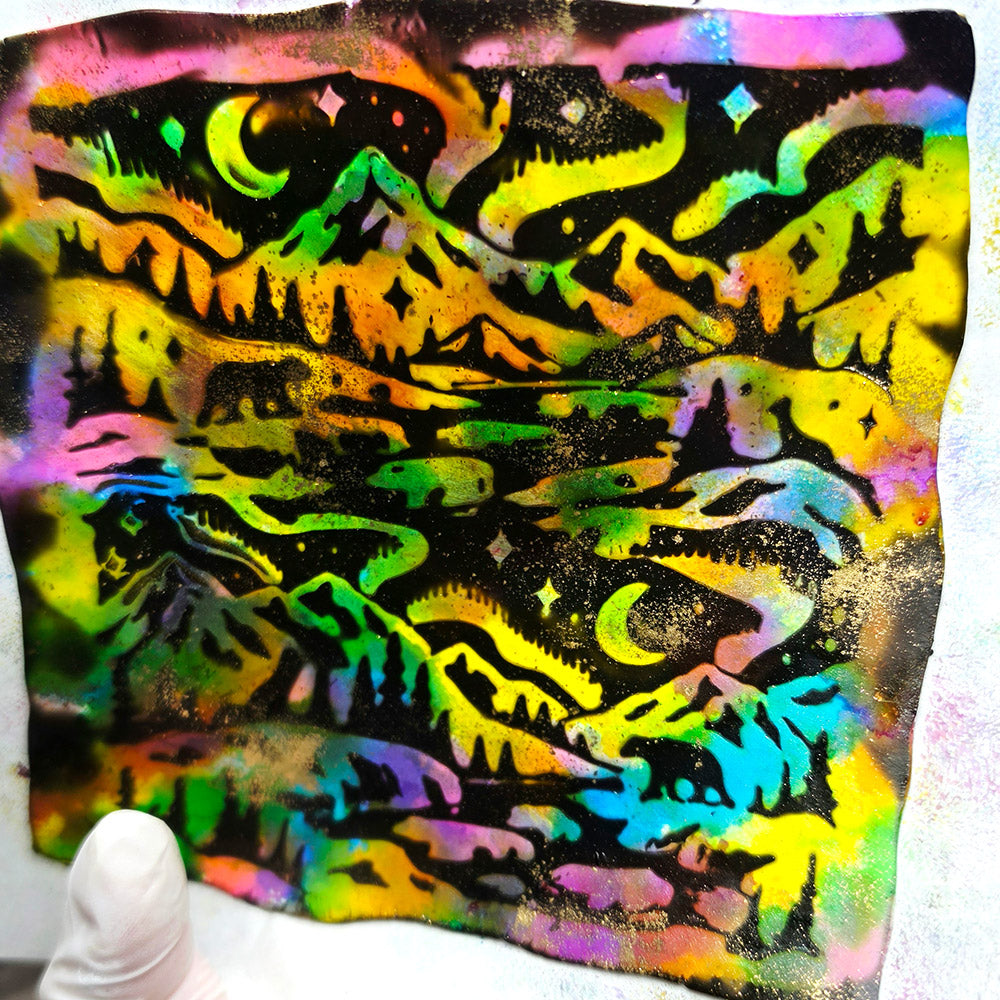 Polymer clay sheet textured with the Arctic Night Christmas texture plate