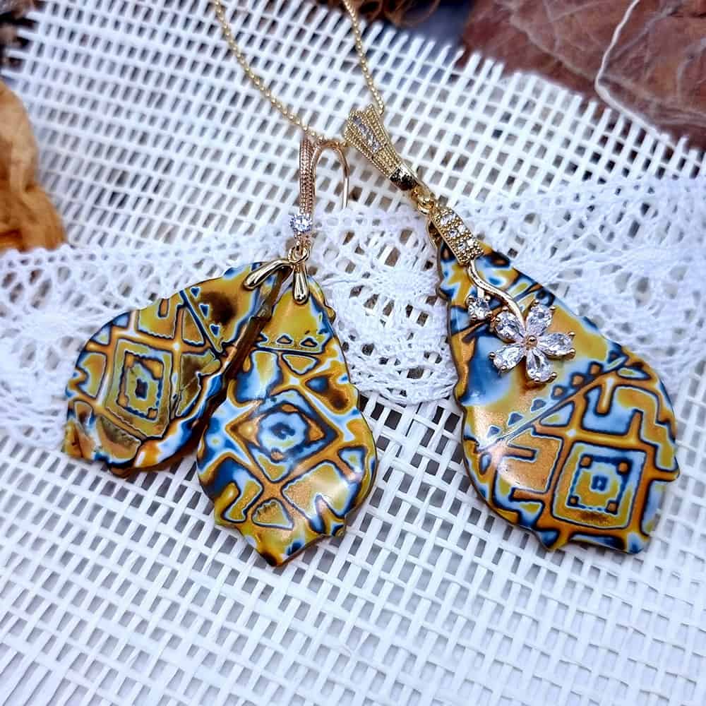 Ukrainian Motifs polymer clay earrings in amber and blue by SweetyBijou