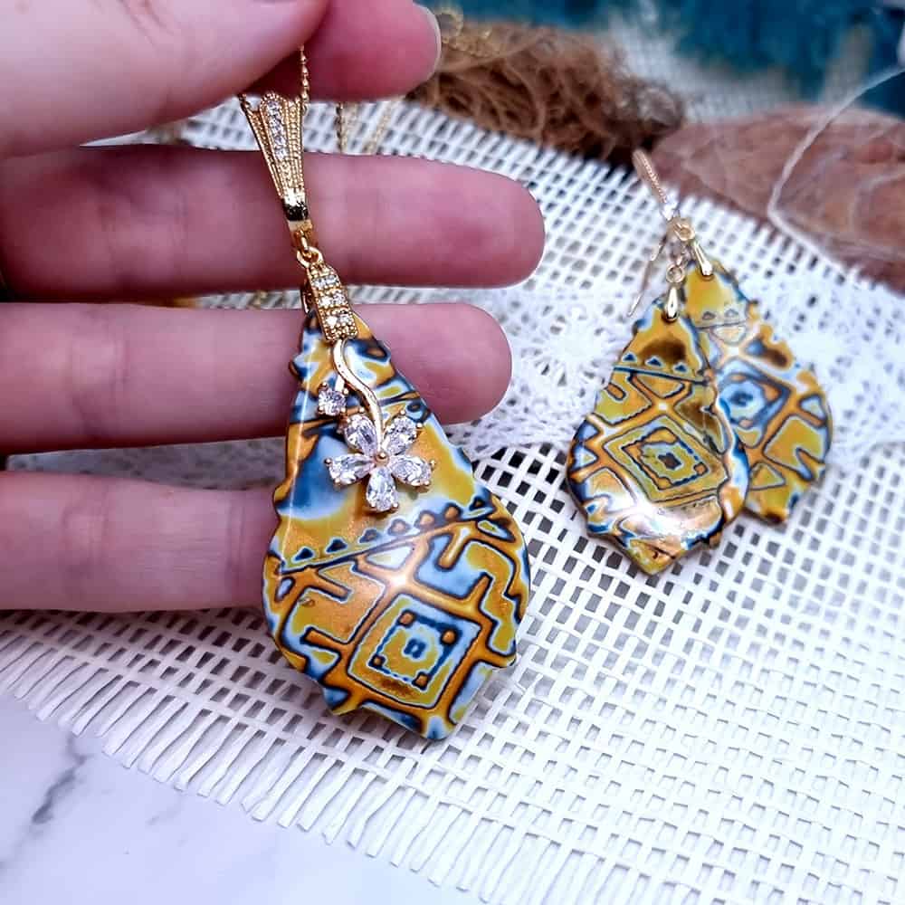 Ukrainian Motifs polymer clay earrings in amber and blue by SweetyBijou