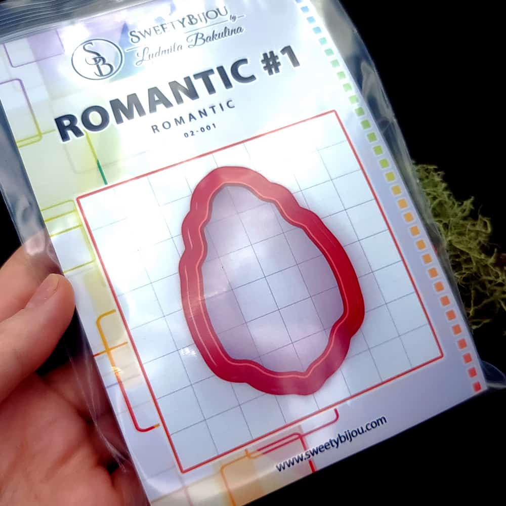 Wavy oval polymer clay cutter with organic softly rippled edge
