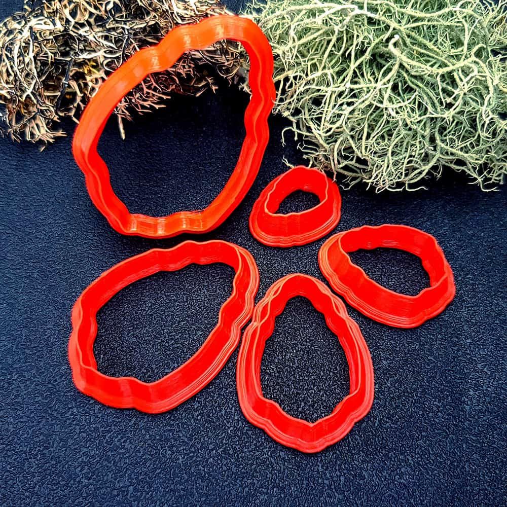 Wavy oval polymer clay cutter with organic softly rippled edge