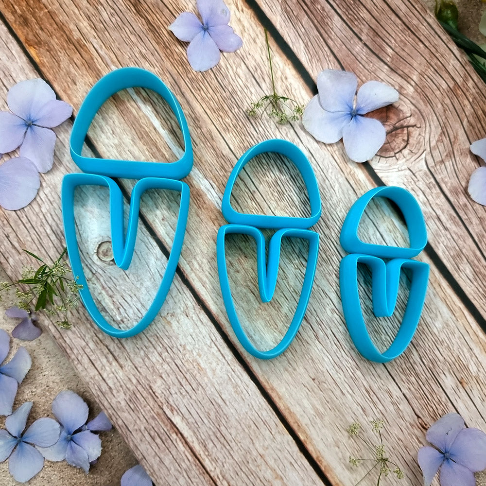 Blue PLA U-shape polymer clay cutter set in three sizes, arch cap and U piece, with finished two-tone clay earring components by SweetyBijou