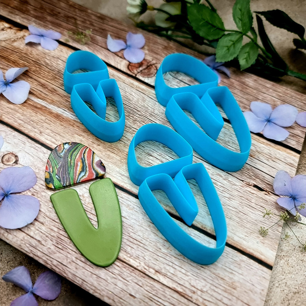 Blue PLA U-shape polymer clay cutter set in three sizes, arch cap and U piece, with finished two-tone clay earring components by SweetyBijou