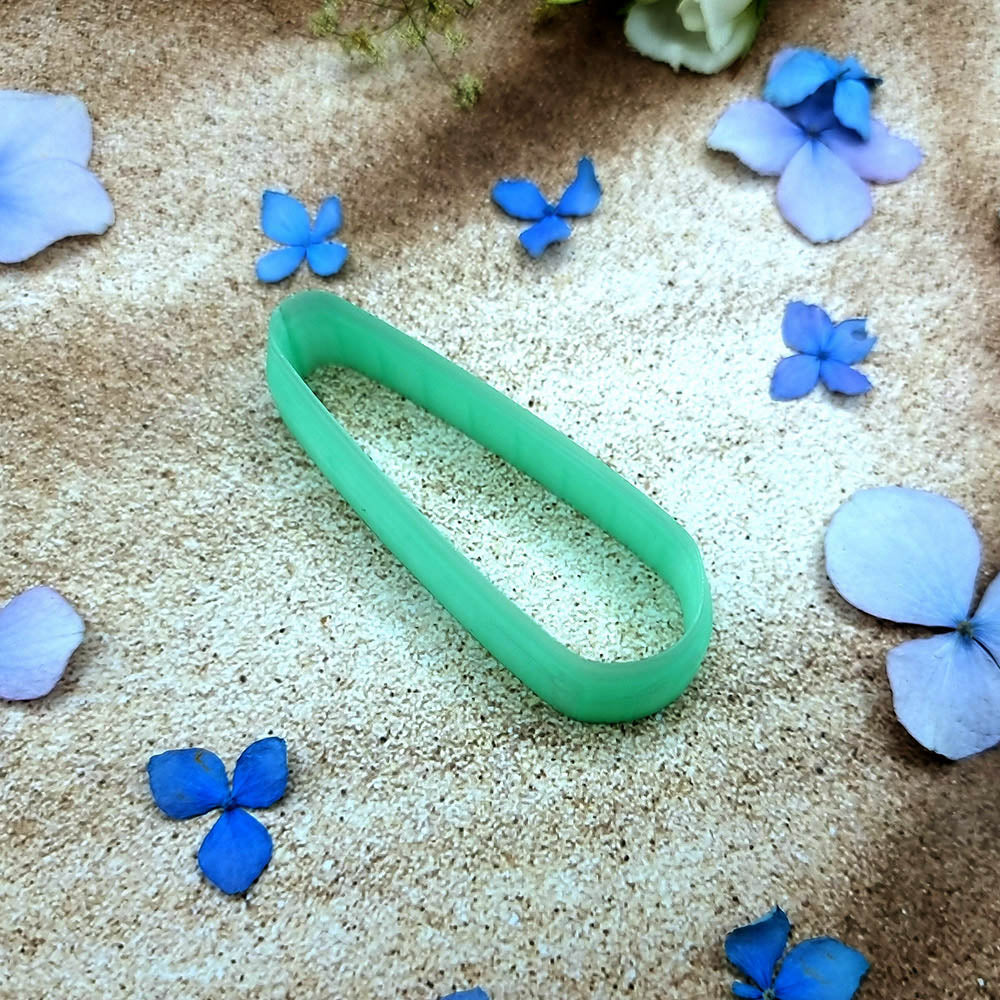 Green PLA capsule bar polymer clay cutter with fully rounded ends and terracotta clay bar earring pieces by SweetyBijou