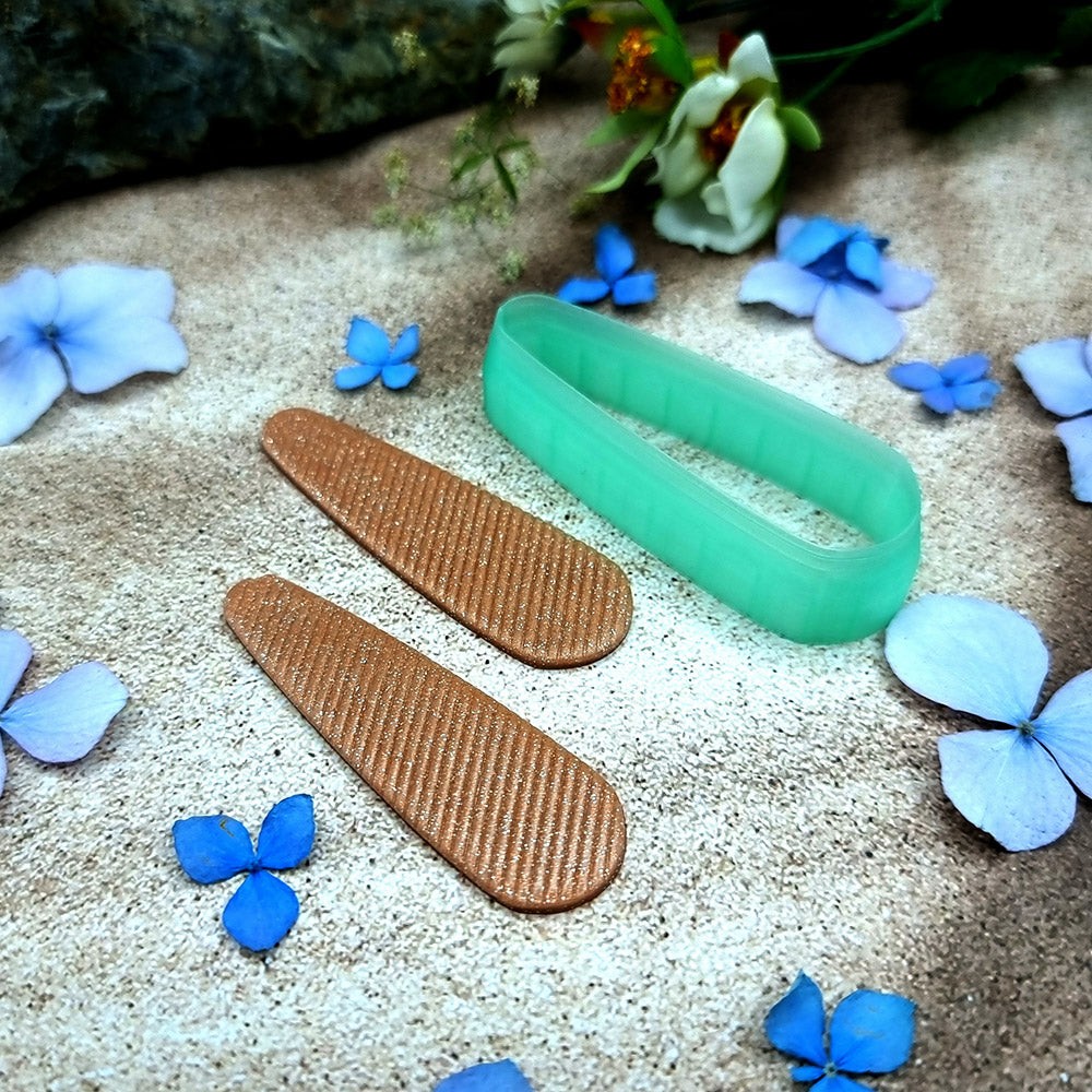 Green PLA capsule bar polymer clay cutter with fully rounded ends and terracotta clay bar earring pieces by SweetyBijou