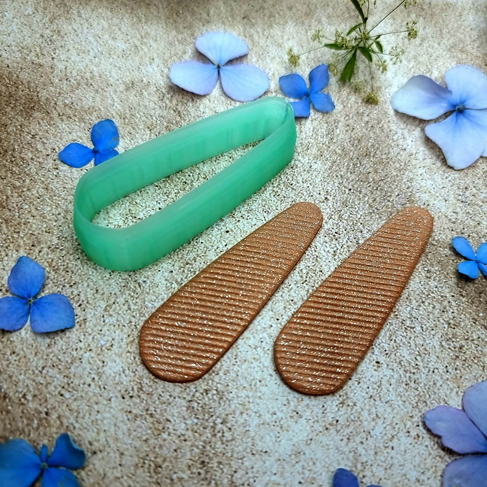 Green PLA capsule bar polymer clay cutter with fully rounded ends and terracotta clay bar earring pieces by SweetyBijou