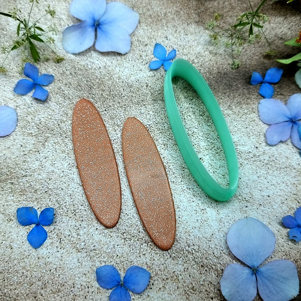 Green PLA long oval polymer clay cutter with smooth rounded ends and terracotta clay oval earring pieces by SweetyBijou
