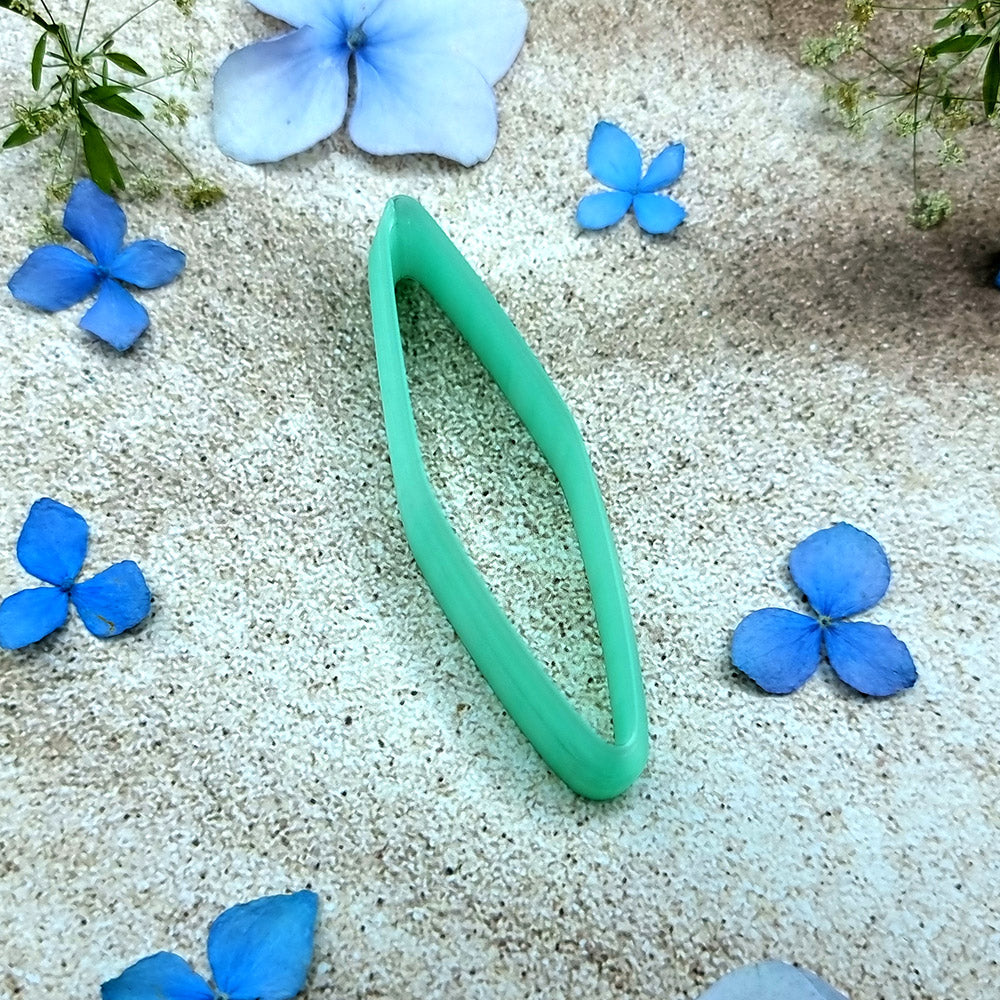 Green PLA willow leaf polymer clay cutter with sharp pointed ends and terracotta clay leaf earring pieces by SweetyBijou