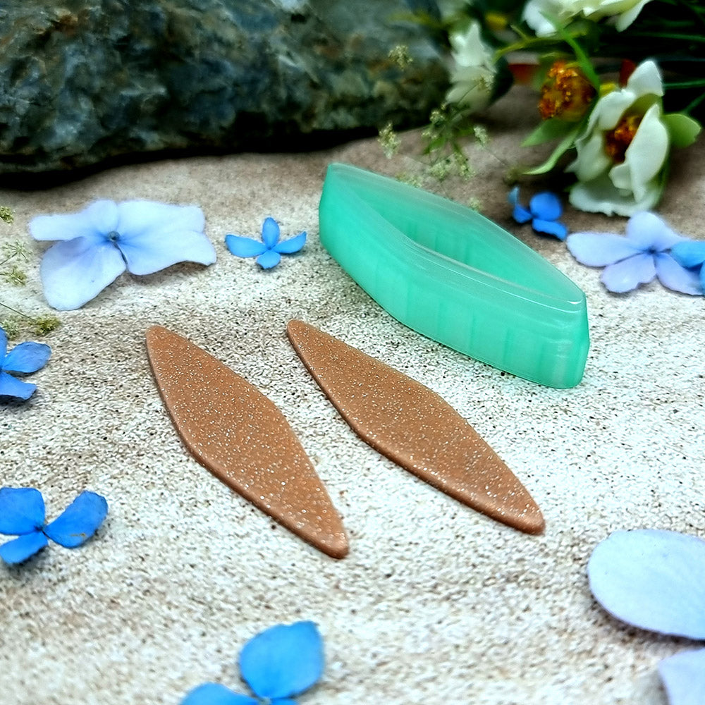 Green PLA willow leaf polymer clay cutter with sharp pointed ends and terracotta clay leaf earring pieces by SweetyBijou