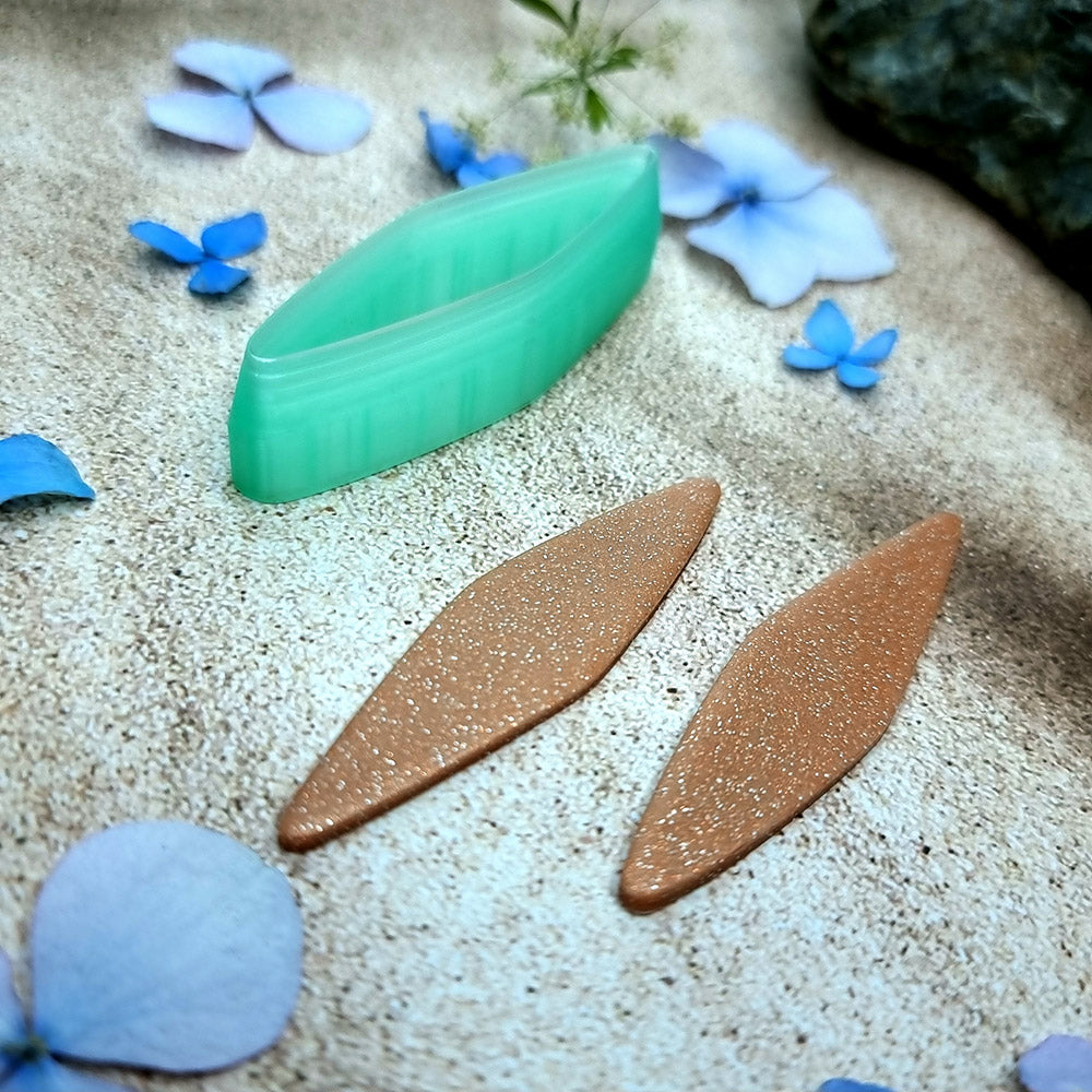 Green PLA willow leaf polymer clay cutter with sharp pointed ends and terracotta clay leaf earring pieces by SweetyBijou