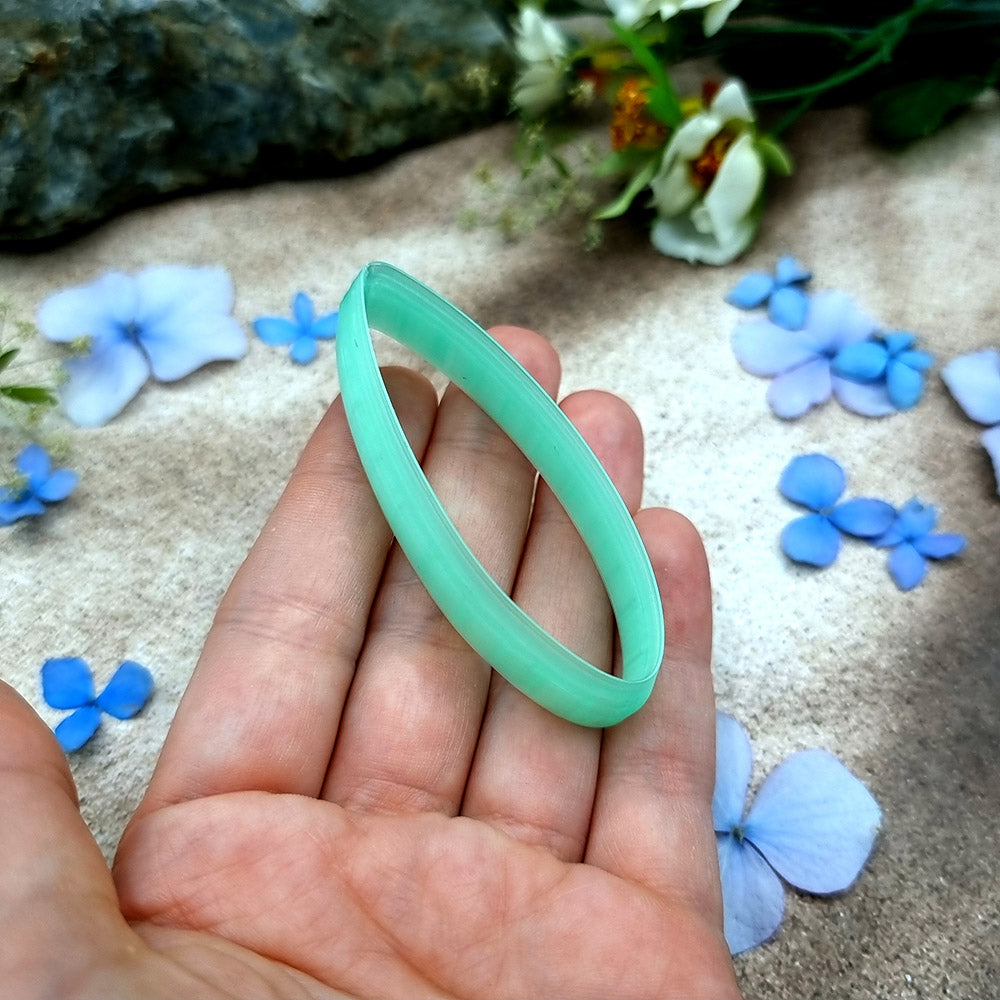 Green PLA almond drop polymer clay cutter with softly pointed ends and terracotta clay almond earring pieces by SweetyBijou