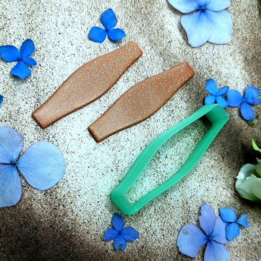 Green PLA faceted shard polymer clay cutter with angled straight edges and terracotta clay shard earring pieces by SweetyBijou