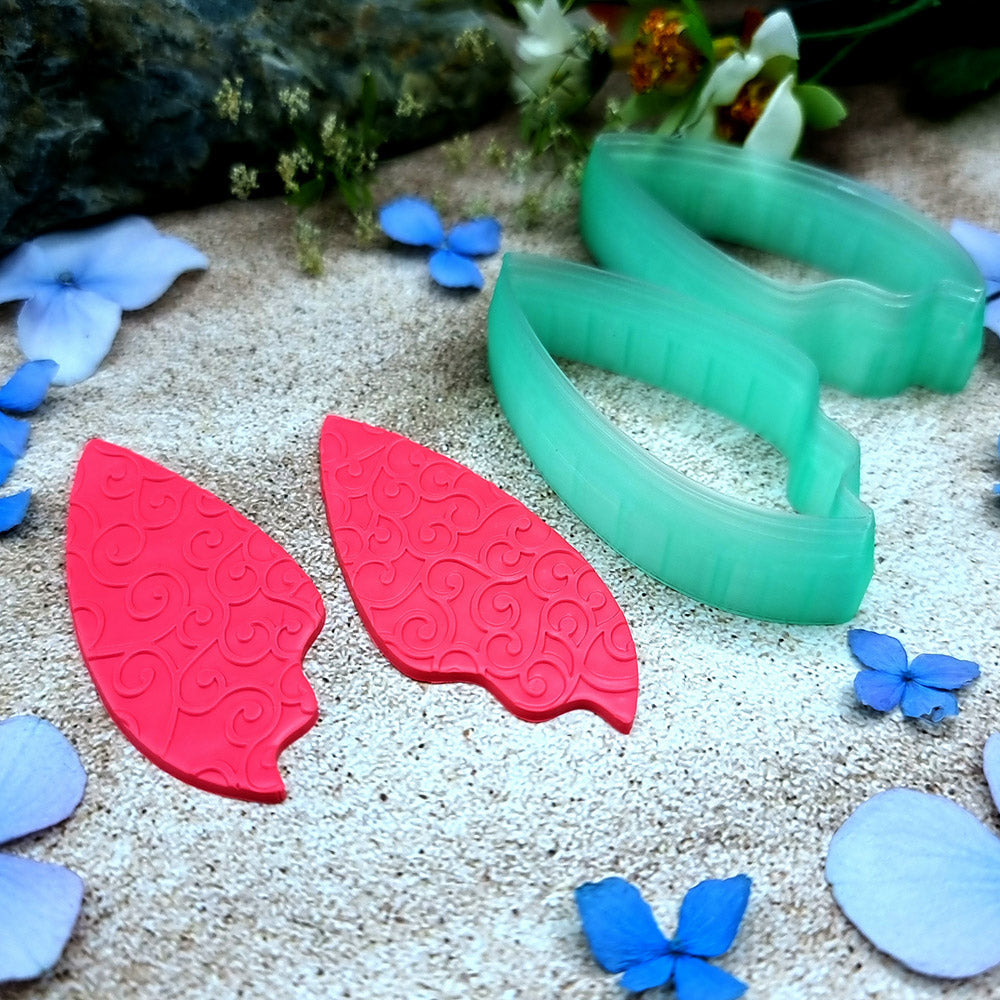 Pair of mirrored green PLA flame petal polymer clay cutters, a left and a right cutter, for long statement earrings by SweetyBijou