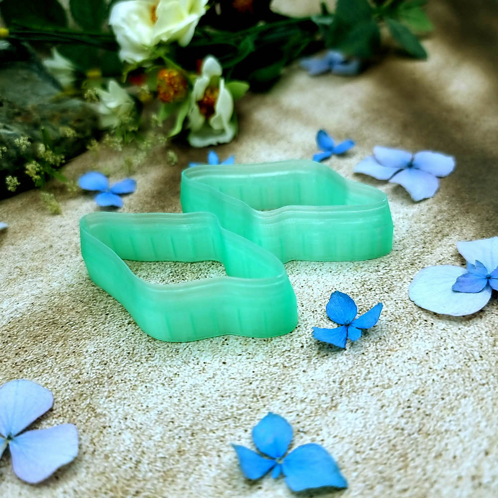 Pair of mirrored green PLA wavy pebble polymer clay cutters, a left and a right cutter, for long statement earrings by SweetyBijou